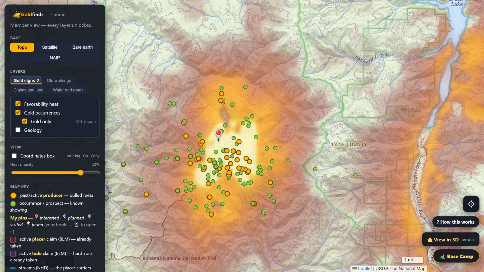 A gold district on the topo with occurrence dots and the favorability heat glowing